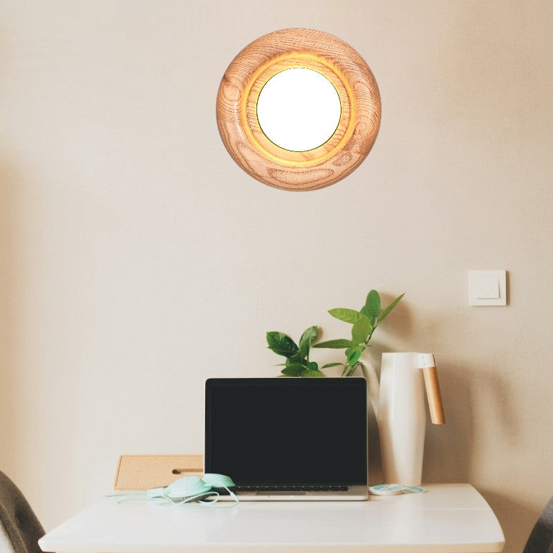 Orbitus Wandlamp – Ronde rust in hout en licht
