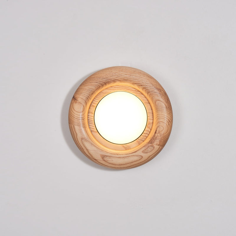 Orbitus Wandlamp – Ronde rust in hout en licht