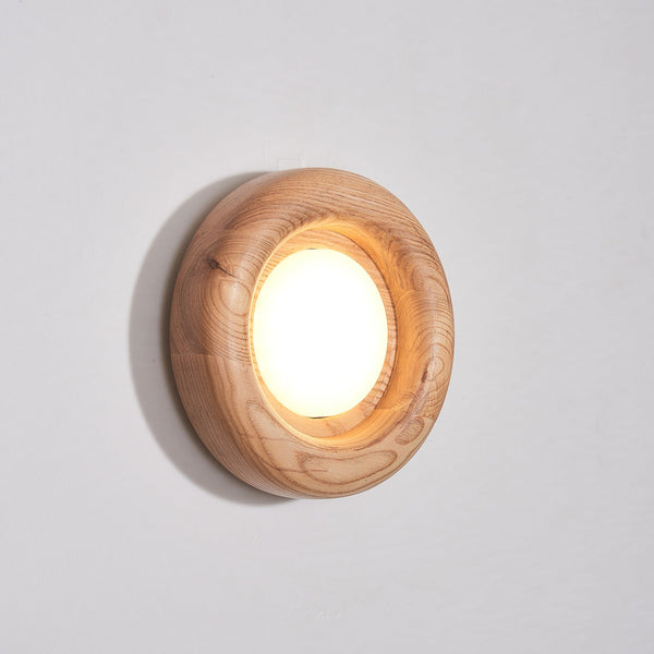 Orbitus Wandlamp – Ronde rust in hout en licht