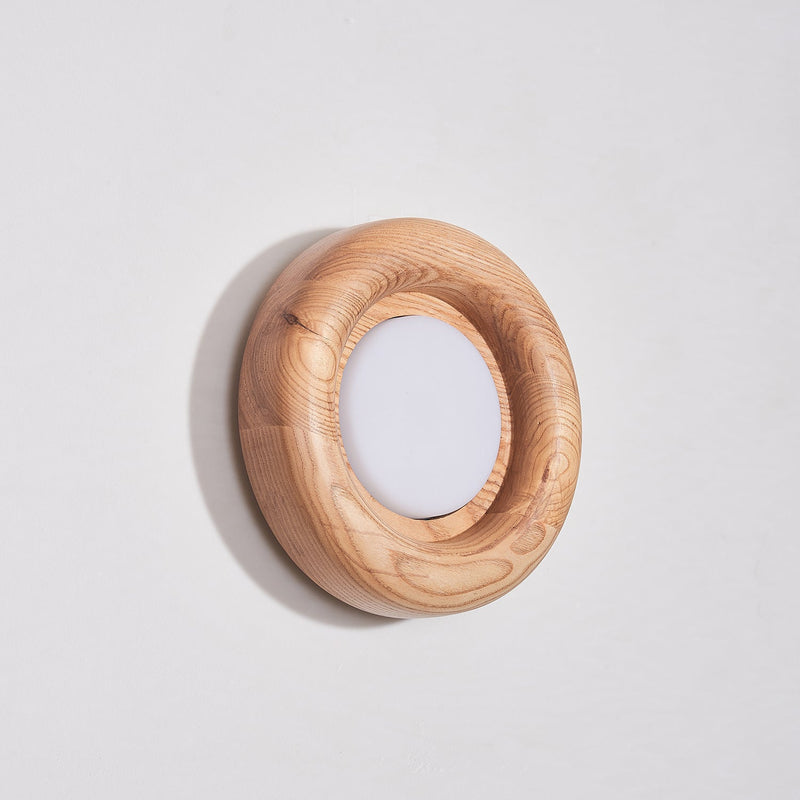Orbitus Wandlamp – Ronde rust in hout en licht