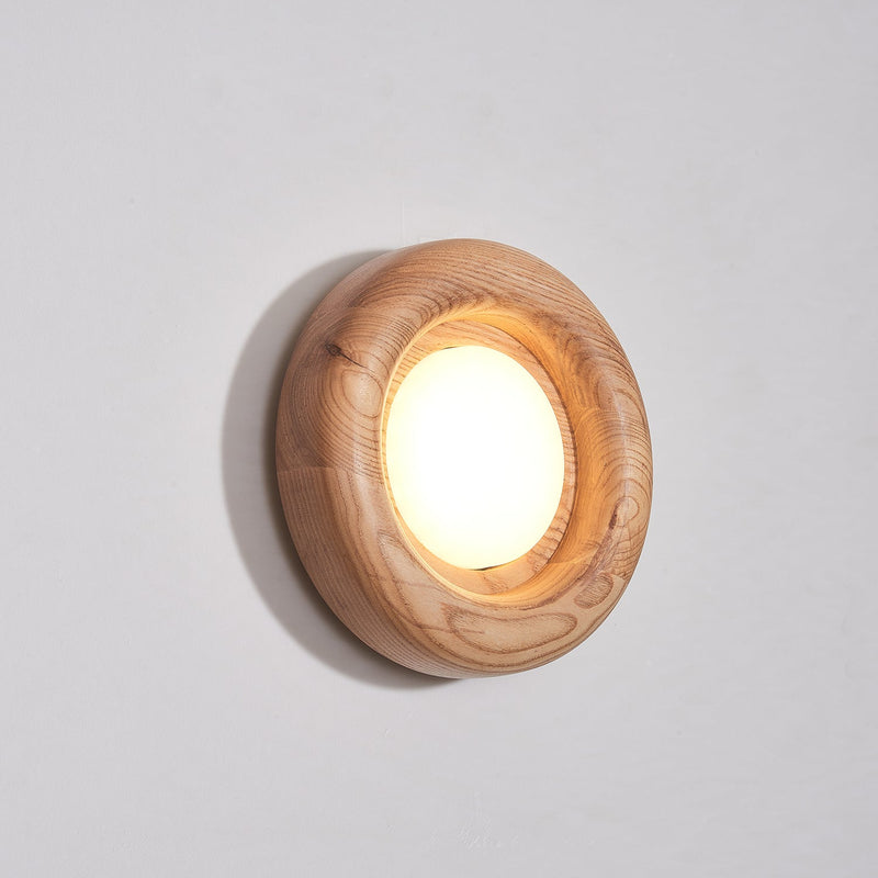 Orbitus Wandlamp – Ronde rust in hout en licht