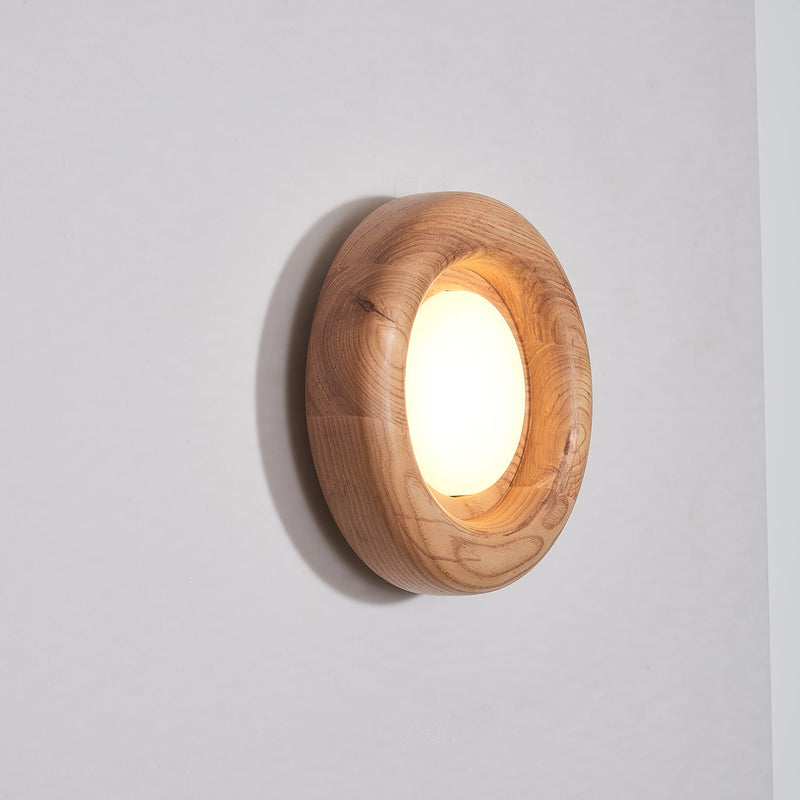Orbitus Wandlamp – Ronde rust in hout en licht