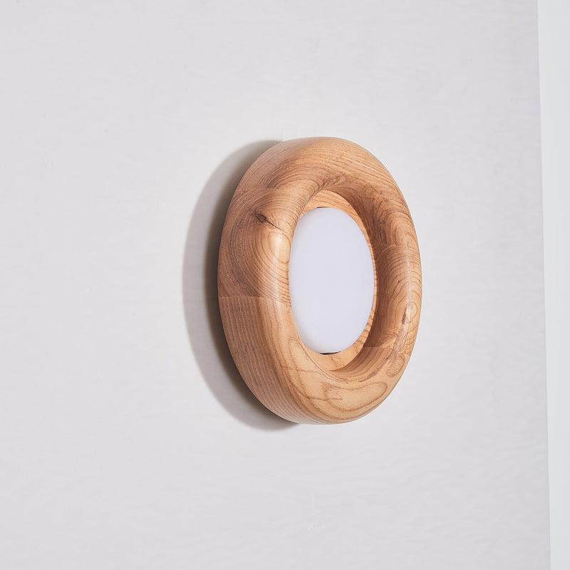 Orbitus Wandlamp – Ronde rust in hout en licht