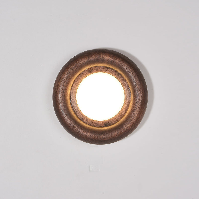 Orbitus Wandlamp – Ronde rust in hout en licht