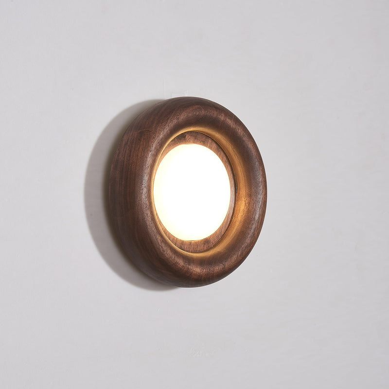 Orbitus Wandlamp – Ronde rust in hout en licht