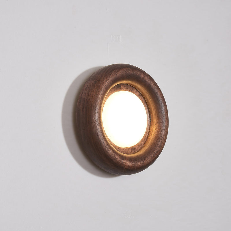 Orbitus Wandlamp – Ronde rust in hout en licht