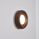 Orbitus Wandlamp – Ronde rust in hout en licht