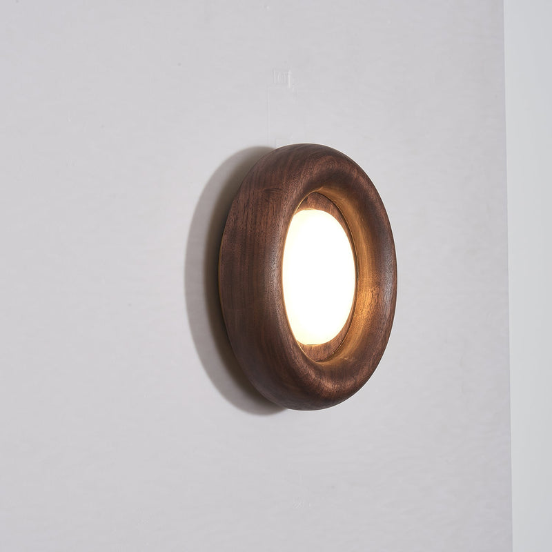 Orbitus Wandlamp – Ronde rust in hout en licht