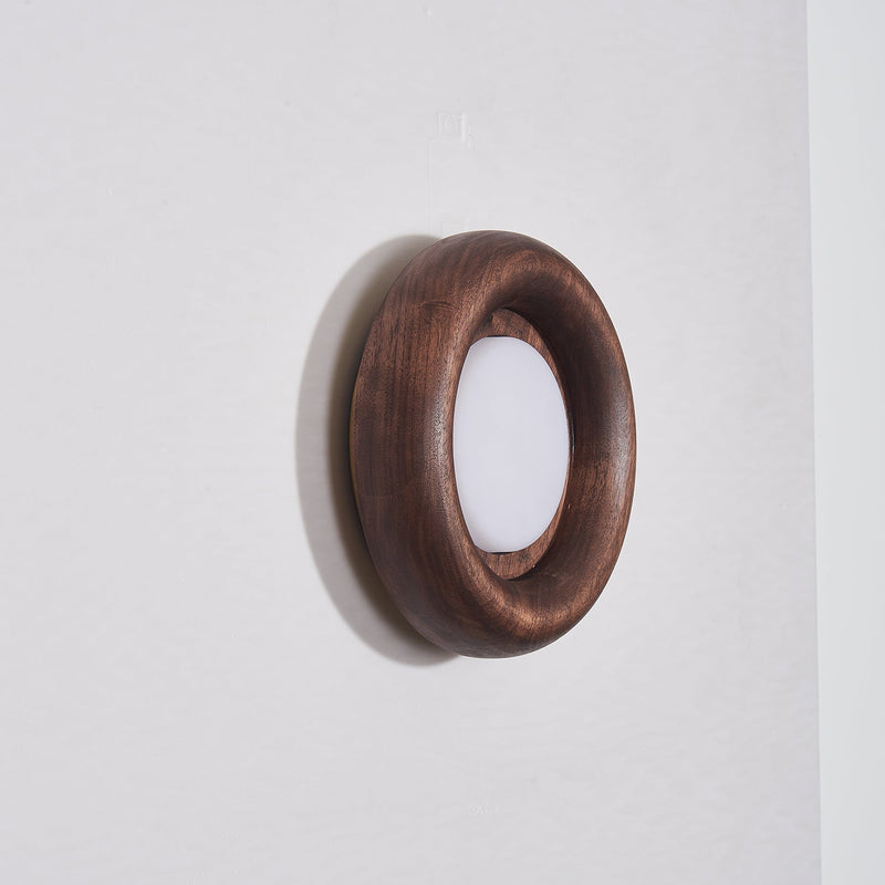 Orbitus Wandlamp – Ronde rust in hout en licht