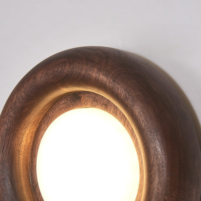 Orbitus Wandlamp – Ronde rust in hout en licht