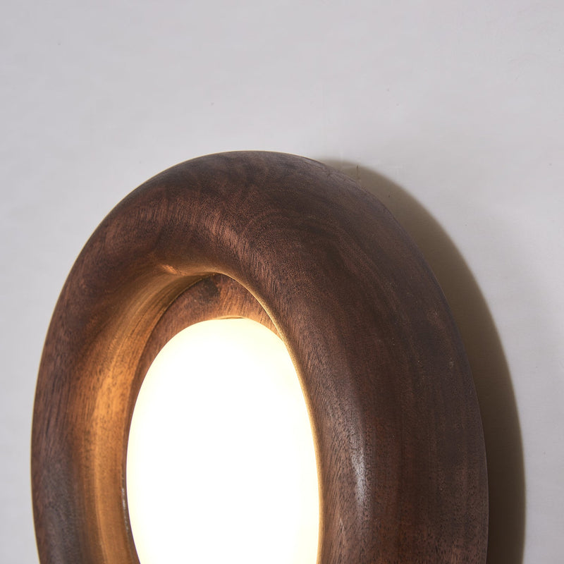 Orbitus Wandlamp – Ronde rust in hout en licht