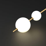 GlobeGlow – Verticale wandlamp met glazen bollen in modern design