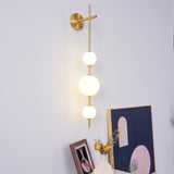 GlobeGlow – Verticale wandlamp met glazen bollen in modern design