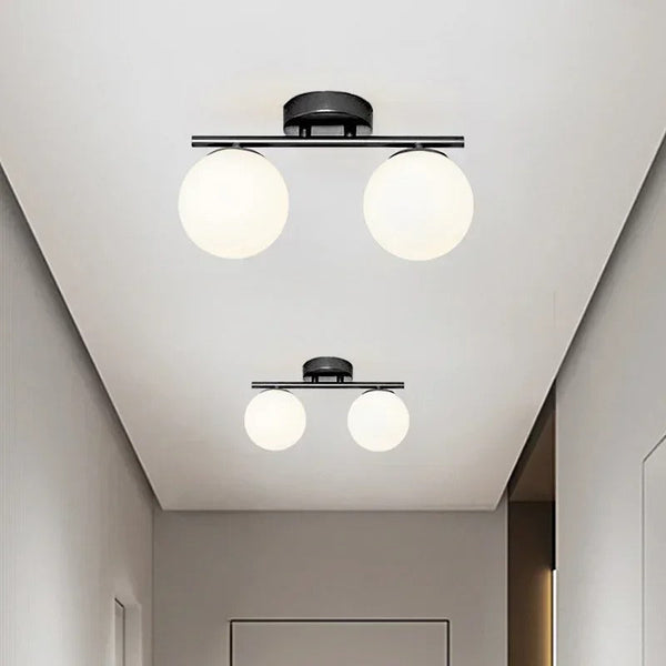 LumeSphere – LED Plafondlamp in glas met gouden accenten