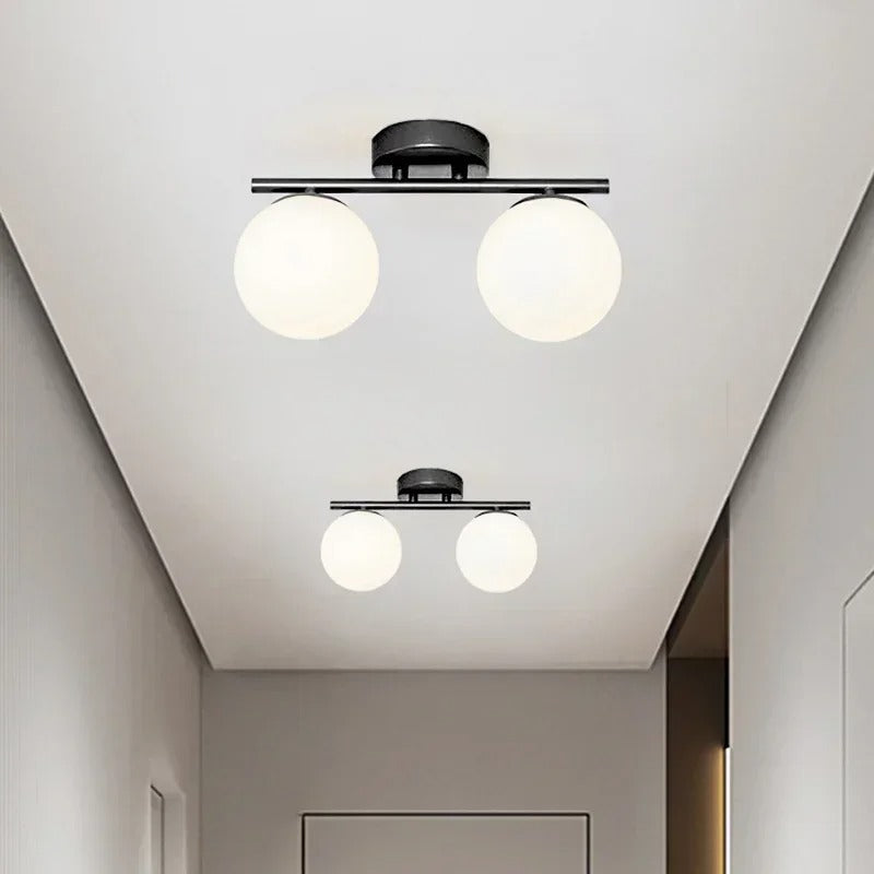 LumeSphere – LED Plafondlamp in glas met gouden accenten