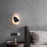 Moderne wandlamp met glazen kap
